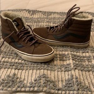 Brown and black high-top vans